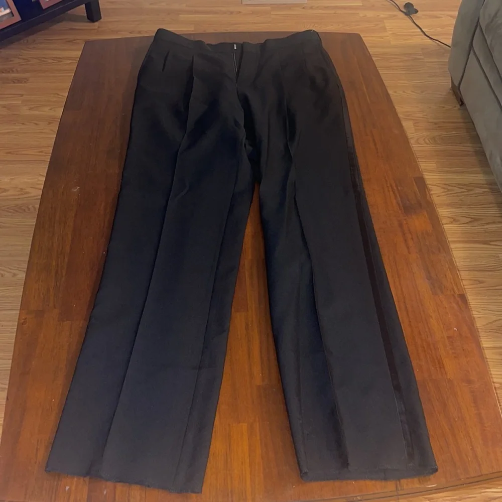 Formal Fashions men’s black tuxedo jacket and pants. Jacket 38S, Pants 34x34
